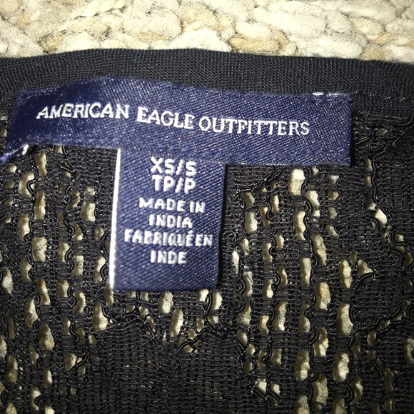 Open front short sleeve vest. - Picture 2 of 5